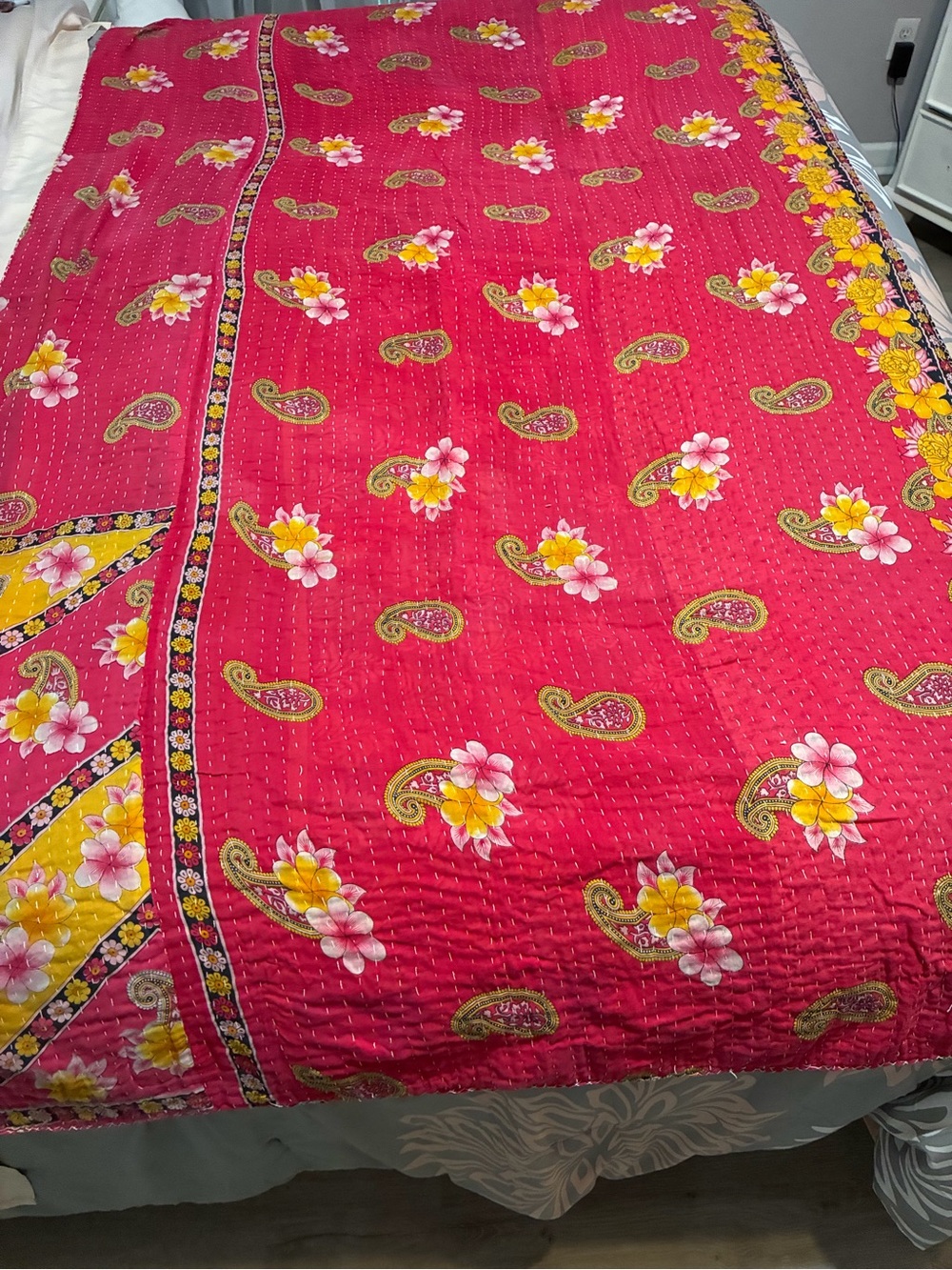 Bright Pink Floral Quilted Throw with Yellow Accents and Multi Color on the Back
